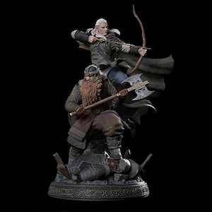 May include: A detailed statue featuring two figures from a fantasy setting. One figure is an archer with a bow, the other is a warrior with an axe. The figures are in action poses, with the warrior standing on a fallen foe. The statue is set against a black background.