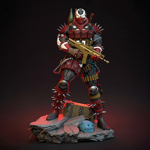 May include: A detailed action figure of a character in a red and black armored suit, holding a gold-colored rifle. The figure is posed on a rocky base with a chest and a blue helmet. The figure has spikes on the shoulders and legs.