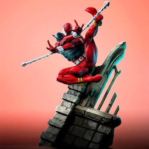 May include: A red and black Spider-Man action figure in a dynamic pose, perched atop a crumbling stone structure. The figure is detailed with web patterns and a white belt. It is holding a silver web shooter.
