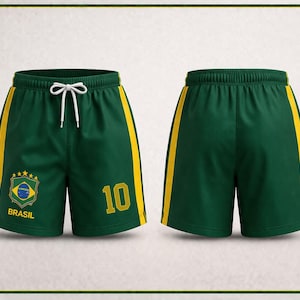 Op de afbeelding: Groene sportbroek met gele zijstrepen en een wit trekkoord. De shorts hebben het Braziliaanse vlagembleem en het nummer 10 in geel. Het woord "BRASIL" staat eronder gedrukt.