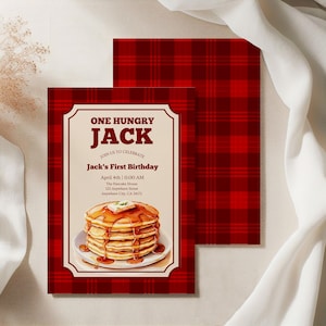 May include: A red plaid birthday invitation with the text "ONE HUNGRY JACK" and "Jack's First Birthday." The invitation features a stack of pancakes with syrup and butter. The date and time are April 4th at 11:00 AM.