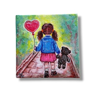 May include: A painting of a young girl walking away, holding a red heart-shaped balloon with the word "LOVE" on it. She wears a blue jacket, pink skirt, and holds a black teddy bear. The background is a blurred green and yellow.