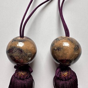 Natural Stone Fūchin with Burgundy Tassels – Japanese Scroll Weight Pair, Earth-Tone Marble Sphere