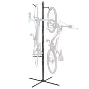 May include: A black, freestanding bicycle storage rack. The rack has a central vertical pole with adjustable arms to hold two bicycles. The base is an X-shaped design for stability. The bicycles are partially visible, with one having blue handlebars.