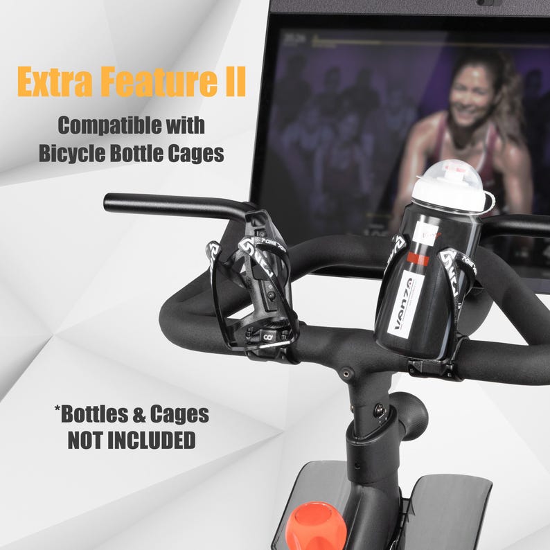 May include: Black water bottle with a white lid and red accents, secured in a black cage on a stationary bike. The text "Extra Feature II" and "Compatible with Bicycle Bottle Cages" are visible. The text "Bottles & Cages NOT INCLUDED" is also visible.