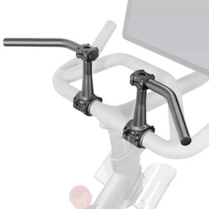 May include: Two black bicycle handlebars with a curved design, mounted on a white bicycle frame. The handlebars are made of metal and have a matte finish. The image is a close-up shot of the handlebars and the bicycle frame.