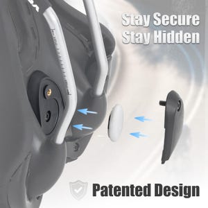 May include: A gray bicycle seat with white and silver accents, featuring a detached white component and a black cover with a screw. Text reads "Stay Secure Stay Hidden" and "Patented Design".