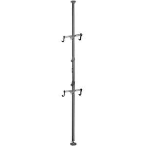 May include: A dark gray, adjustable vertical bike rack. The rack has two sets of arms with curved hooks to hold bicycles. The rack is designed to be mounted between the floor and ceiling, providing a space-saving storage solution.