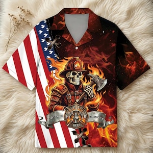 May include: Short-sleeved button-up shirt featuring a firefighter skull design. The shirt has an American flag on the left side and a fiery background. The firefighter skull is holding an axe and wearing a helmet. The shirt also has the words "Firefighter Dept."