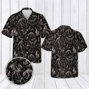 May include: A short-sleeve button-down shirt featuring an all-over black and white print of mythical creatures including Bigfoot, the Loch Ness Monster, jackalopes, and mothmen, interspersed with pine trees, mountains, and crescent moon symbols.