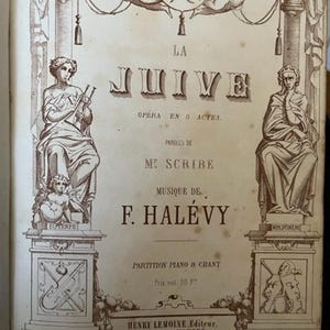 May include: Antique sheet music cover for "La Juive," an opera in 5 acts. The cover features ornate illustrations of classical figures, cherubs, and architectural elements in sepia tones. Text includes the title, composer, and publisher.