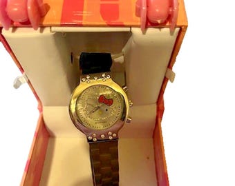 Reloj de pulsera vintage rojo de Hello Kitty de Sanrio, fabricado en Japón