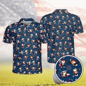 May include: Navy blue polo shirt with a repeating pattern of cartoon eagles in golf attire, golf carts, and fireworks. The shirt has a white collar and buttons. The background features an American flag.