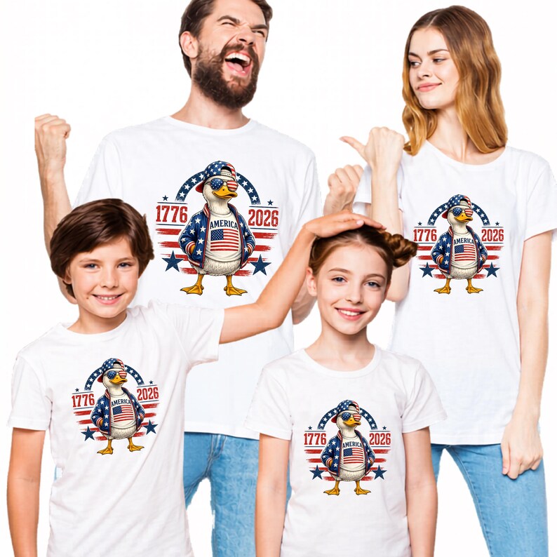 Family wearing matching America 250th anniversary shirts with patriotic eagle graphic for Fourth of July celebrations.