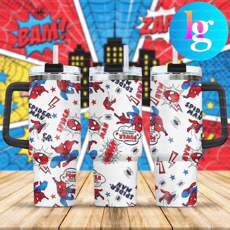 Three Spider-Man-themed stainless steel tumblers with handles, set against a colorful comic book-style background.