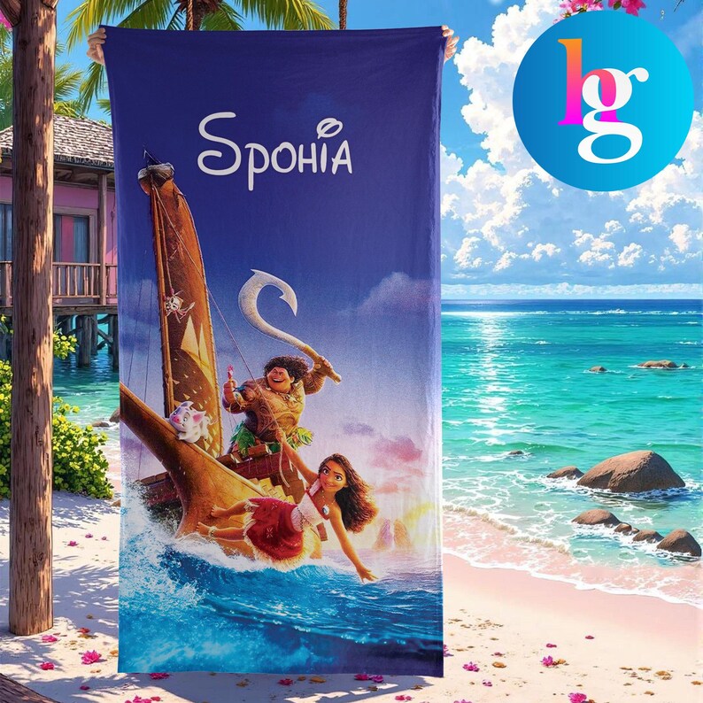 a beach scene with a large blue towel featuring an illustration of two characters from the movie "Moana" on it, along with a palm tree and a clear blue sky in the background.