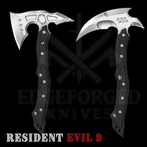 May include: Two tactical axes with silver-toned metal heads and black textured handles secured by multiple silver screws. The left axe features a wide blade with cutouts, while the right axe has a curved, pointed blade. Text reads RESIDENT EVIL 9.