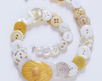 Land of the midnight sun button necklace