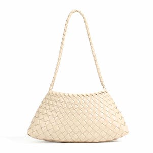 May include: A cream-colored shoulder bag featuring an intricate woven pattern across the entire body. The bag has a trapezoidal shape with a wide base and a single, long, braided strap attached to the top corners for carrying over the shoulder.