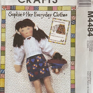 May include: A sewing pattern for a ragtime doll named Sophie. The pattern includes a school dress and a topsy-turvey doll. The pattern is from McCall's Crafts and is number M4484.