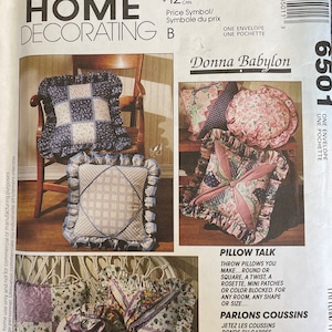 May include: A sewing pattern for making throw pillows. The pattern includes instructions for making round, square, and rosette-shaped pillows. The pattern is called "Donna Babylon" and is from McCall's Home Decorating.