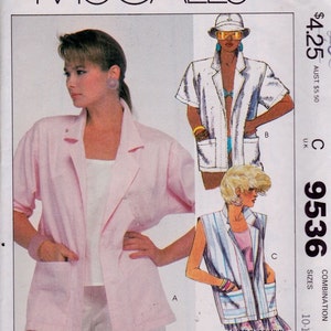 May include: A sewing pattern for jackets, featuring three different styles. The pattern is for sizes 10-12-14 and is called McCall's 9536.