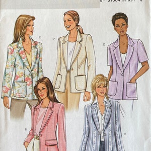 May include: Butterick sewing pattern B4138 featuring blazer designs. The pattern includes various styles, such as a floral print, solid pink, and striped blazers. The pattern is labeled "Fast & Easy" and includes sizes 8, 10, and 12.