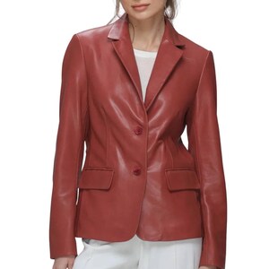 Red Leather Blazer in premium genuine lambskin, featuring a tailored single-breasted notch lapel profile, single button closure, and classic side flap pockets, styled elegantly with high-waisted white trousers.