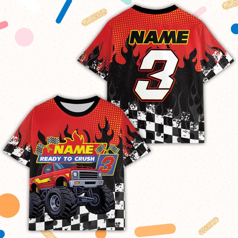 May include: Red and black graphic t-shirt featuring a monster truck design. The shirt has the word "NAME" and the number "3" on the front and back. The front of the shirt also has the text "READY TO CRUSH".
