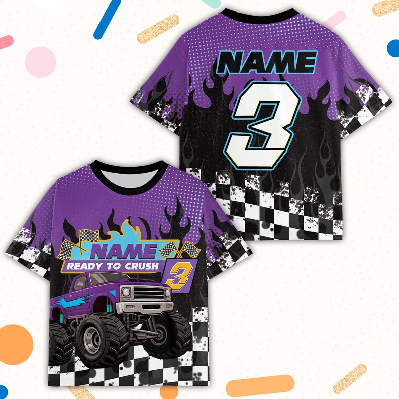 May include: Purple and black short-sleeve shirt with a monster truck graphic. The shirt features the text "NAME" and the number "3" in white and blue. The design includes flames and a checkered flag pattern.