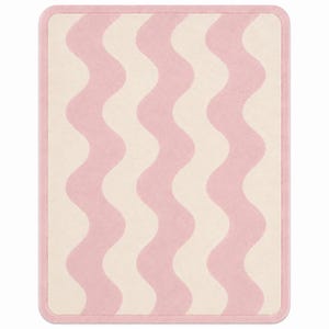 May include: A rectangular area rug featuring a repeating vertical wavy pattern in soft pink and cream colors. The rug has rounded corners and is finished with a solid pink border that frames the entire design, creating a clean and uniform edge.