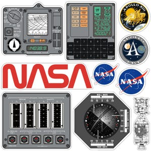 May include: A selection of NASA-themed stickers, including instrument panels, the NASA logo in red, and Apollo mission emblems. The stickers feature gauges, readouts, and control panels, with a retro design.