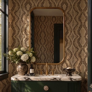 May include: A bathroom vanity featuring a dark green fluted cabinet with two drawers, gold circular knobs, and a white marble countertop. Above sits a rectangular mirror with rounded corners, a brass faucet, a vase of white flowers, and a soap dish.
