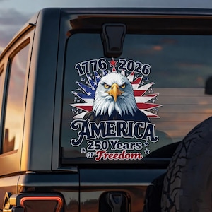 May include: A patriotic decal featuring a detailed illustration of an American bald eagle with a stern expression, set against a backdrop of the American flag. The text reads "1776-2026" and "AMERICA 250 Years of Freedom."