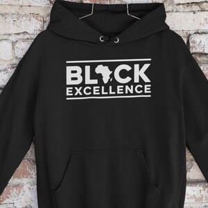 Celebra l'eccellenza nera e il potere della melanina con questa felpa con cappuccio afroamericana