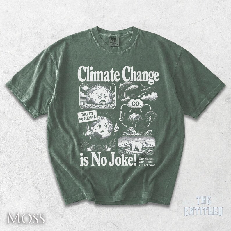 May include: A moss green short-sleeve t-shirt featuring a white graphic print with the text "Climate Change is No Joke!" and "THERE'S NO PLANET B!". The design includes illustrations of a sad earth, a CO2 cycle, and a polar bear on ice.