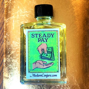 May include: A clear glass bottle with a black cap, containing a yellow liquid. The label on the bottle reads "STEADY PAY" and features an illustration of a hand receiving money. The website address "ModernConjure.com" is printed at the bottom of the label.