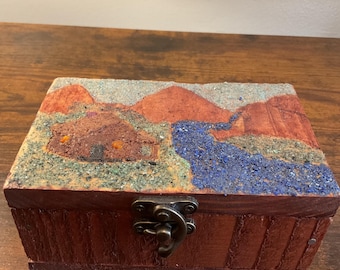 Hand made treasure chest. Decorated with gemstones. Cabin scene. Filled with real authentic artifacts and treasures.