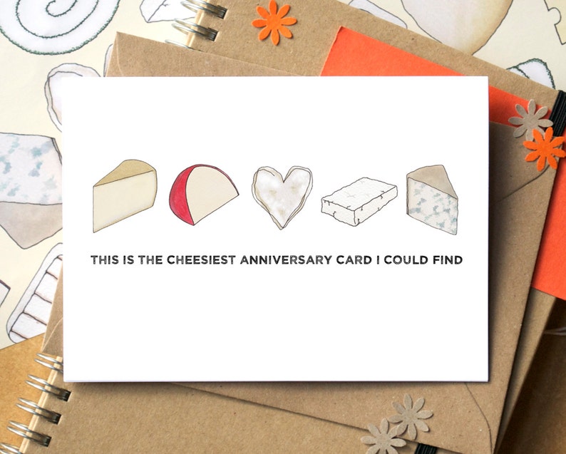 Greetings card showing a row of small colourful cheese illustrations and the phrase below "this is the cheesiest anniversary card I could find"