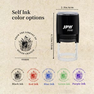 May include: A black self-inking stamp with the text "From the Library of Megan Craigie" and a skull design. The stamp is 4.72 inches (12 cm) tall and 2.3 inches (6 cm) wide. Color options include black, red, blue, green, and purple ink.
