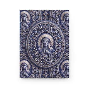 May include: A rectangular notebook cover featuring a repeating pattern of a person wearing a traditional feathered headdress. The design is rendered in shades of deep blue and cream, with intricate scrollwork and circular motifs surrounding each figure.