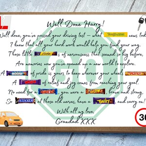 May include: A rectangular cardboard gift box featuring a printed congratulatory message for a driving test pass. The design includes a red L-plate, car keys, a yellow car, a speed limit sign, and various candy bars integrated into the text.