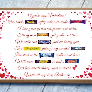 May include: A rectangular cardboard gift box featuring a white insert printed with red hearts and a poem titled You're my Valentine! The poem incorporates various candy bar wrappers including Twirl, Wispa, Lion, Snickers, Tangfastics, Boost, MilkyWay, Flake, and TimeOut.