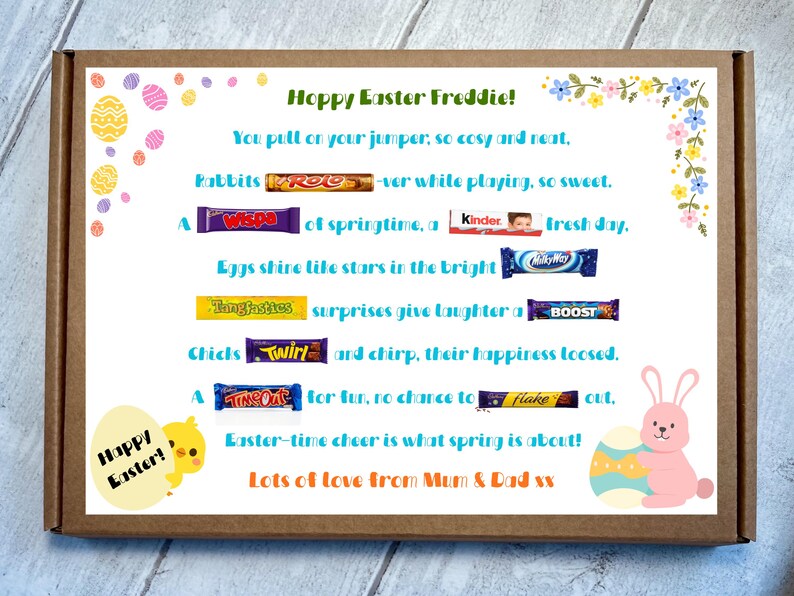 May include: A brown cardboard gift box containing a printed Easter message for Freddie. The card features colorful egg illustrations, a yellow chick, a pink bunny, and various candy bars integrated into the text, including Rolo, Wispa, Kinder, MilkyWay, Tangfastics, Boost, Twirl, TimeOut, and Flake.