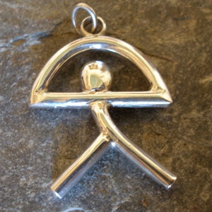 Indalo Man is a lucky symbol derived from an ancient cave painting in Almeria, Andalucia, Spain.  My Indalo Man can be made as a pendant necklace or keyring and is made in either sterling silver or 9ct Gold.