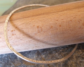 Sterling Silver Oval Hammered and Textured Bangle. Buy 1, 3 or more Bangles. Highly polished shiny Sterling Silver, or in a Matt finish.