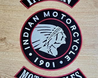 May include: Three embroidered patches with the words "INDIAN MOTORCYCLE" and "1901". The central patch is circular, featuring a Native American profile in white against a black background, encircled by the words "INDIAN MOTORCYCLE".
