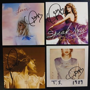 May include: A set of three ceramic mugs with a speckled, matte finish. Each mug features a different color: light blue, cream, and gray. The mugs have a simple, modern design and a comfortable handle.