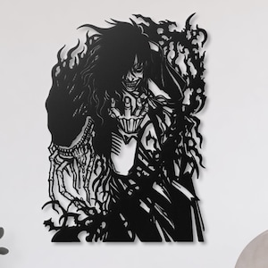 May include: Black metal wall art featuring a detailed silhouette of a figure with long hair and a skeletal hand. The artwork has a gothic or anime style, with intricate cut-out details and a dark, dramatic appearance.