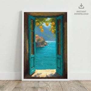 May include: A framed art print depicting a vibrant coastal scene. Turquoise blue doors open to a view of a bright blue sea, a hillside village, and hanging lemons. The artwork is framed in white and set against a wooden floor.